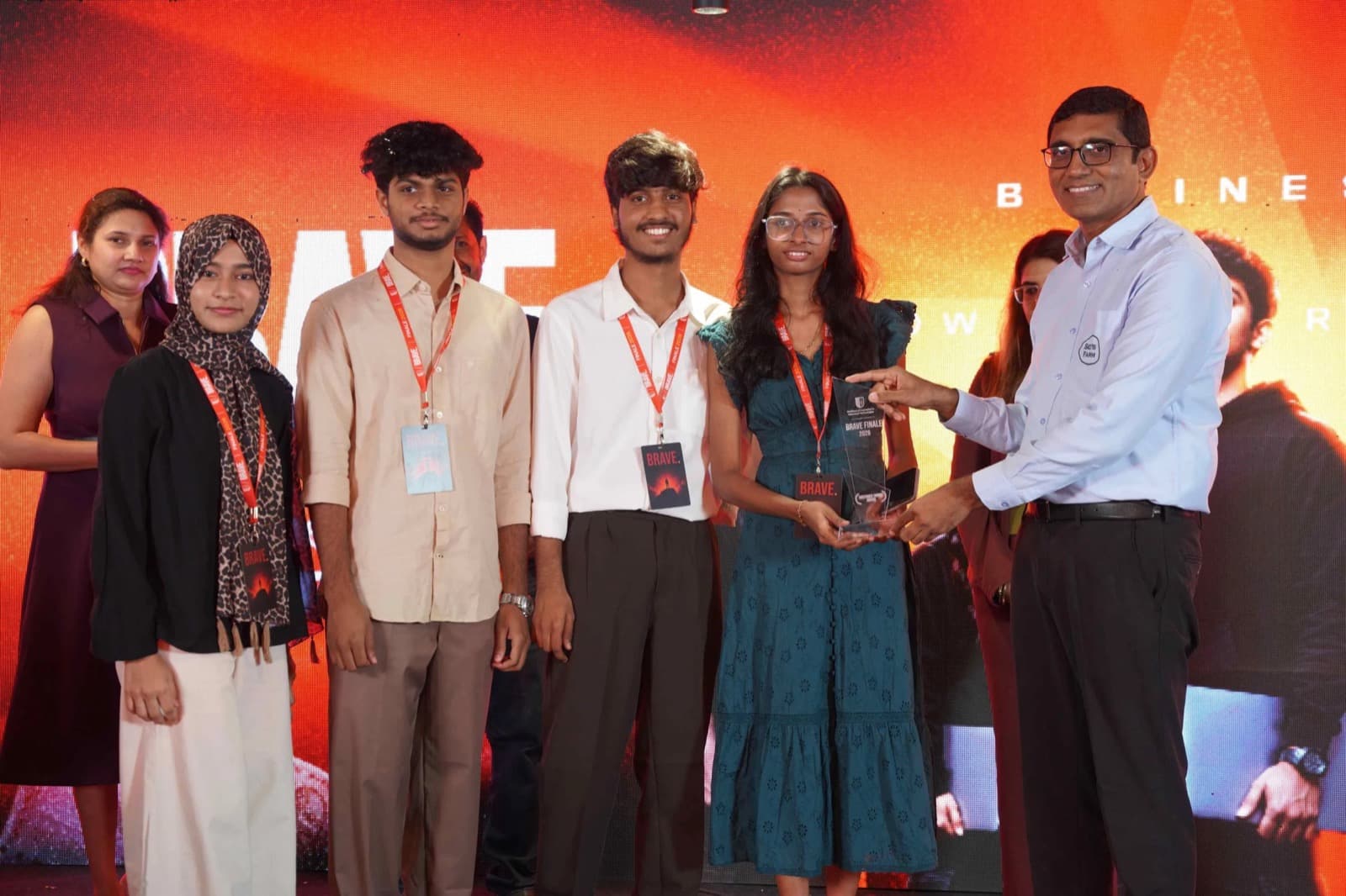 Hero image from Construction World — BuildTrack team with the BRAVE award at TakeOver 2026